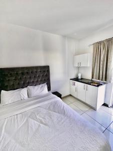 Η κουζίνα ή μικρή κουζίνα στο Beatrice Guesthouse