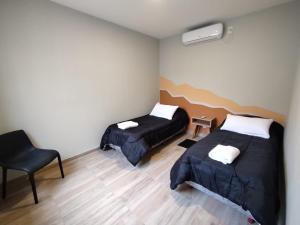 Katil atau katil-katil dalam bilik di Casa Faziano