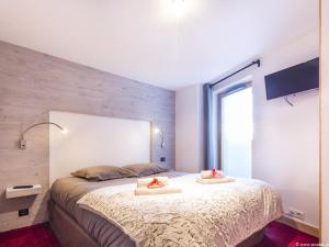 Postel nebo postele na pokoji v ubytování Magnifique 4 pièces avec piscine, jacuzzi, et cheminée à Avoriaz - FR-1-314-133