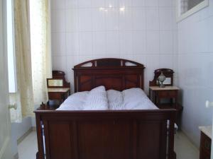 Casa Marina Olhaoにあるベッド