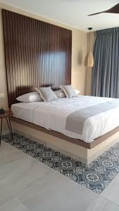 Hotel Yaxactun 객실 침대