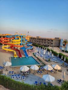 an aerial view of a water park with a water slide at Porto Matrouh for FAMILIES ONLY in Marsa Matruh