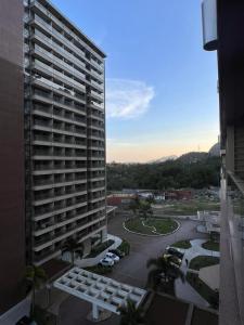 a view of a large building with a parking lot at Via Premiere Suite 710B in Rio de Janeiro
