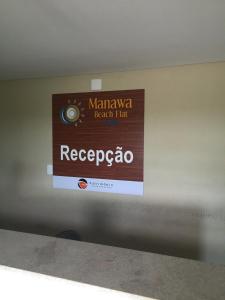 a sign on a wall that saysrecederereo at Manawa Beach Flat A24 - Centro Porto de Galinhas in Porto De Galinhas