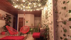 Posezení v ubytování Hospedaje Casa Rosa Jardín