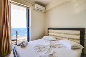 Postel nebo postele na pokoji v ubytování Summer Dream Hotel