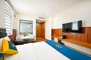 TV a/nebo společenská místnost v ubytování PLUS VUNG TAU HOTEL