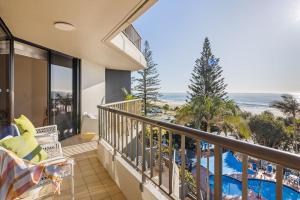 a balcony with a view of the beach and the ocean at The Rocks Resort Unit 4C in Gold Coast