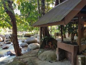 Zahrada ubytování D'Impiana Riverview Chalet # Lenggong