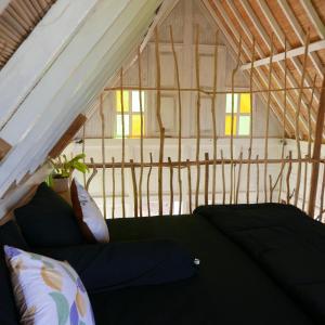 Llit o llits en una habitació de Pondok isoke