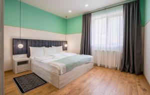 Postel nebo postele na pokoji v ubytování Devdaraki Apartments