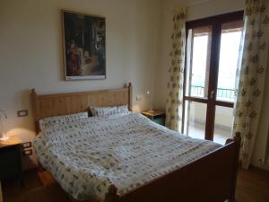 Ein Bett oder Betten in einem Zimmer der Unterkunft Casa Ghibellina