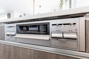 a toaster oven on a counter in a kitchen at The MOON in Sapporo