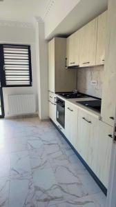 Kuchyň nebo kuchyňský kout v ubytování YES HOME ERK + 6 fotografií