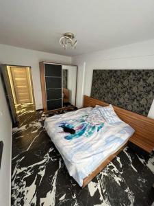 Tempat tidur dalam kamar di Luxury Apartments by Patrik