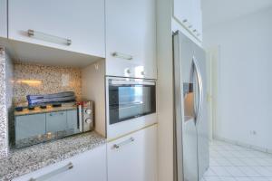 Kuchyň nebo kuchyňský kout v ubytování Residenza Parco Carona - Happy Rentals
