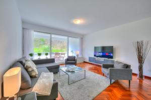 TV a/nebo společenská místnost v ubytování Residenza Parco Carona - Happy Rentals