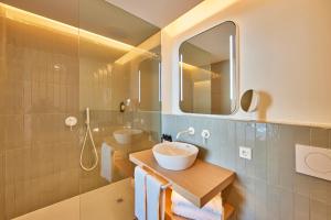 Ванная комната в Universal Hotel Aquamarin