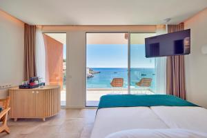 Телевизор и/или развлекательный центр в Universal Hotel Aquamarin