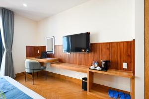 TV a/nebo společenská místnost v ubytování PLUS VUNG TAU HOTEL