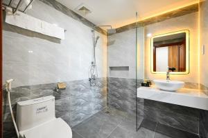 Koupelna v ubytování PLUS VUNG TAU HOTEL