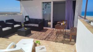Posedenie v ubytovaní IMPLUVIUM Conil-Terraza Privada-Parking- mayores de 25 años