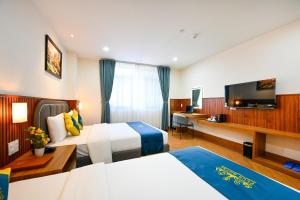 TV a/nebo společenská místnost v ubytování PLUS VUNG TAU HOTEL
