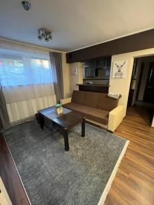 Posezení v ubytování Apartament Kąkolowa