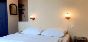 Letto o letti in una camera di Casa Gialla B&B