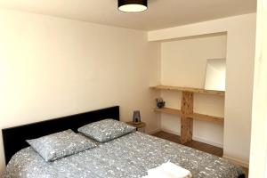 Säng eller sängar i ett rum på Escapade bretonne idéalement située