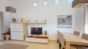 Μια τηλεόραση ή/και κέντρο ψυχαγωγίας στο Casa Armstrong - A Murcia Holiday Rentals Property