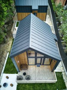 an overhead view of a house with a roof at Norway Cabins in Sinaia