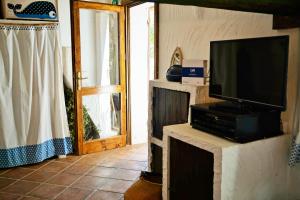 Μια τηλεόραση ή/και κέντρο ψυχαγωγίας στο Sa Selvaggia by Holiday World