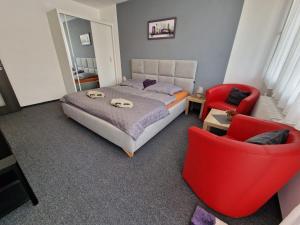 Postel nebo postele na pokoji v ubytování Apartmán U Petra