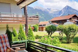 a balcony with a view of the mountains at Ferienwohnung Bergjuwel in Fischen