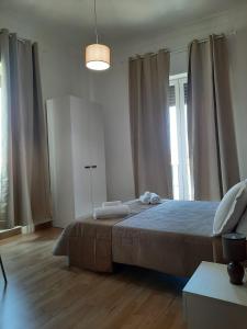 Postel nebo postele na pokoji v ubytování LE CAMERE DI VIA MECCIO