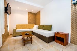 A television and/or entertainment centre at Kiriakos Holiday Home