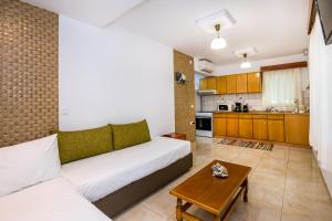 A kitchen or kitchenette at Kiriakos Holiday Home