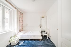 Katil atau katil-katil dalam bilik di Self-Check-In Hotel Adlon
