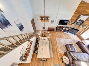 an overhead view of a living room with a table at Giant Steps 58 Ski In-out in Brian Head