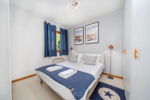 Giường trong phòng chung tại Casa del Golfo