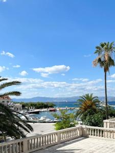 a balcony with a view of a body of water at Luxury apartment Aura in Supetar