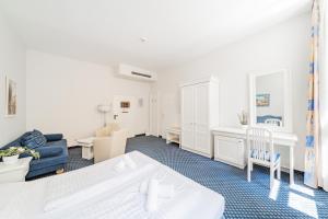 Katil atau katil-katil dalam bilik di Self-Check-In Hotel Adlon