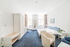 Katil atau katil-katil dalam bilik di Self-Check-In Hotel Adlon