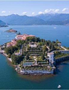 an island in the middle of a body of water at Casa Varenne in Stropino