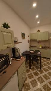 A cozinha ou cozinha compacta de Al Geranio accomodation