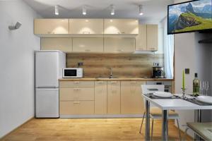 Monopoly Apartments - 9 tesisinde mutfak veya mini mutfak