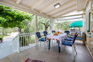 A balcony or terrace at Kiriakos Holiday Home
