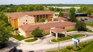 an overhead view of a building with a parking lot at Sonesta Select Bettendorf in Bettendorf