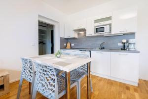 Kuchyň nebo kuchyňský kout v ubytování Horský apartmán Temari 12 Klínovec